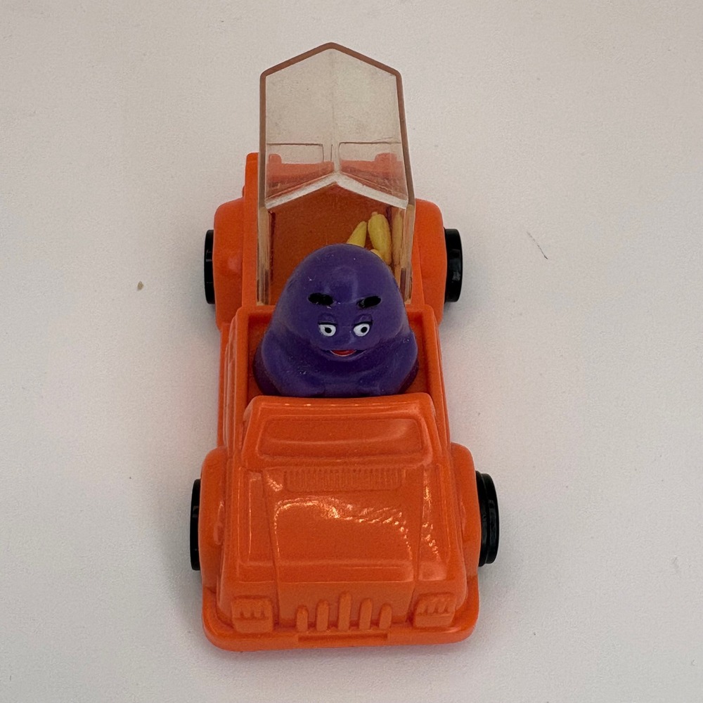 Vintage 1995 McDonalds Happy Meal Toy Grimace Orange Pickup Truck Corn Rattle